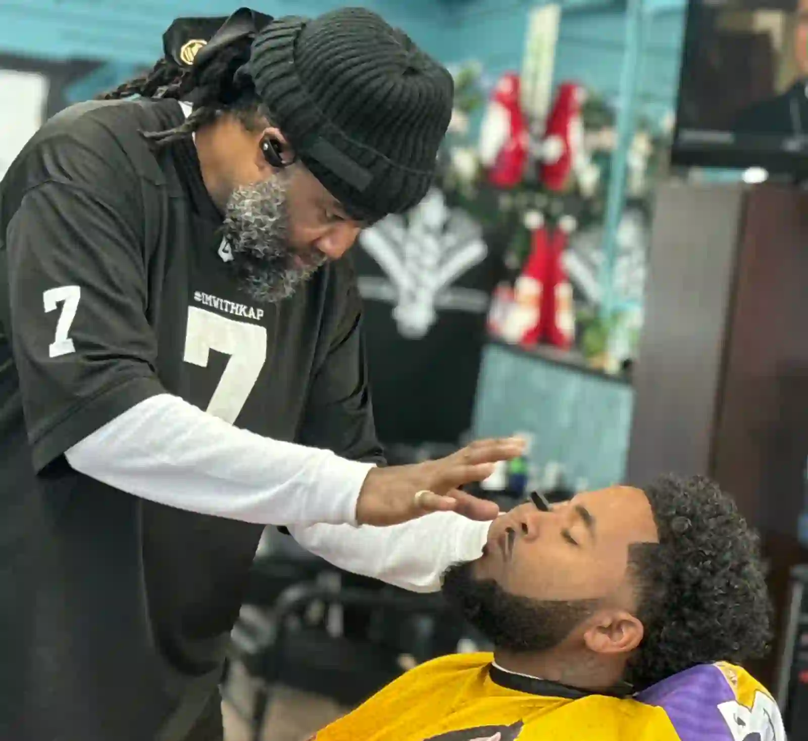 Professional haircut and beard care at Drapes and Tapes